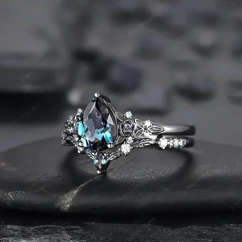 2 - Piece Set: Gothic Black & Golden Engagement Ring Set with Pear - Shaped Cubic Zirconia - thewrightstore