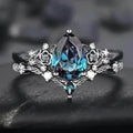 2 - Piece Set: Gothic Black & Golden Engagement Ring Set with Pear - Shaped Cubic Zirconia - thewrightstore