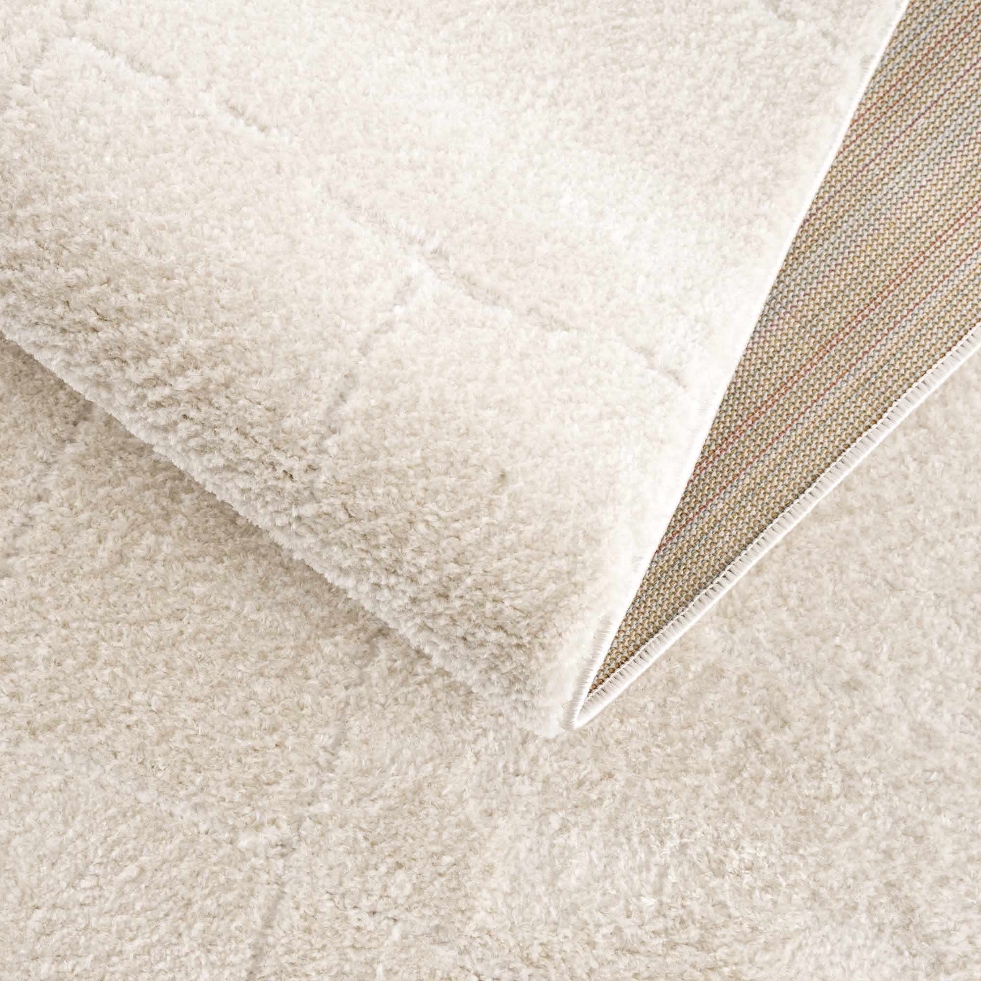 Koume Ivory Area Rug - thewrightstore