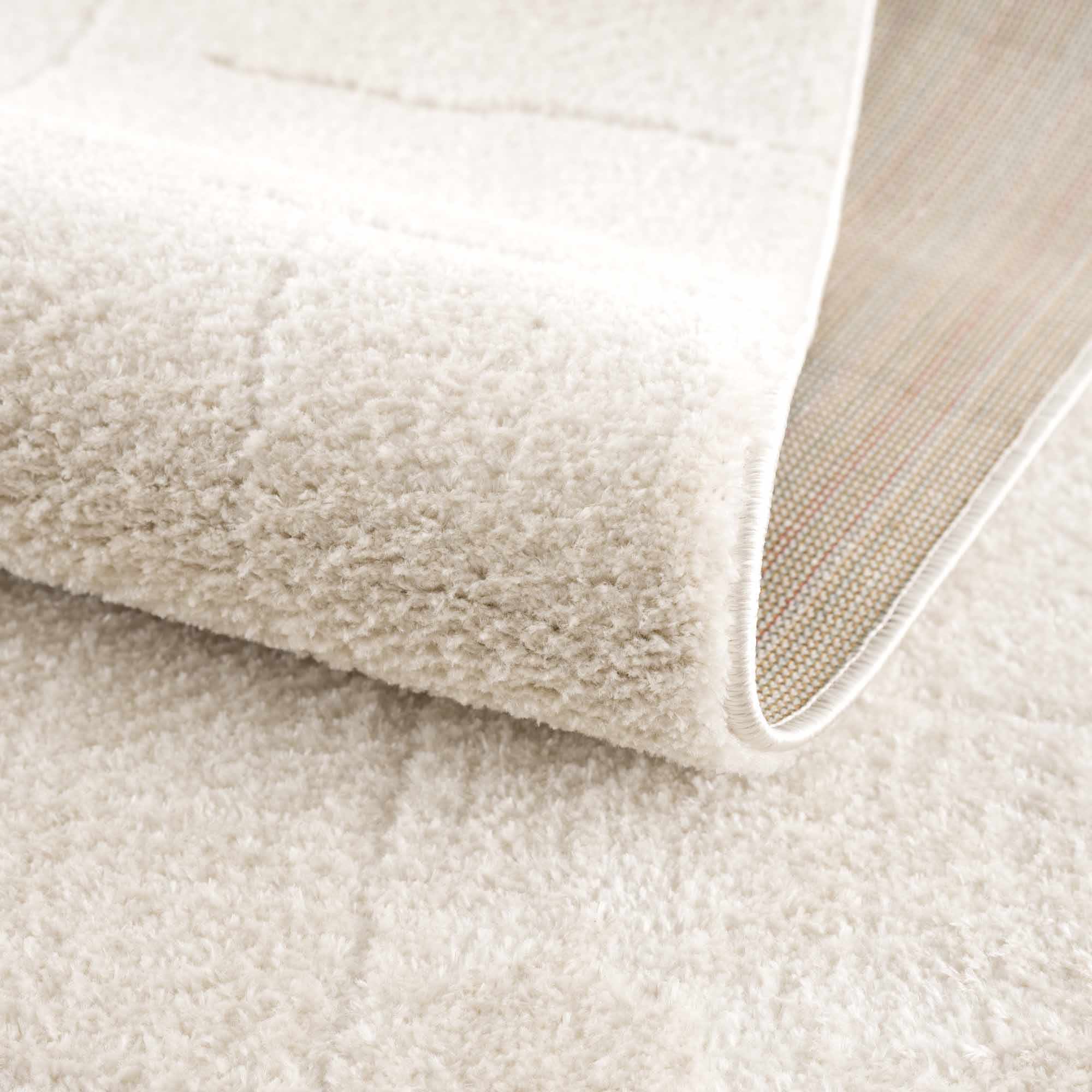 Koume Ivory Area Rug - thewrightstore