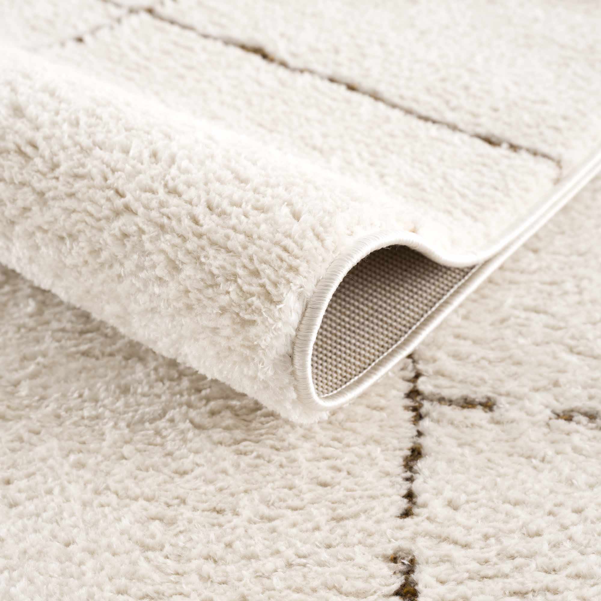 Koume Ivory & Brown Area Rug - thewrightstore