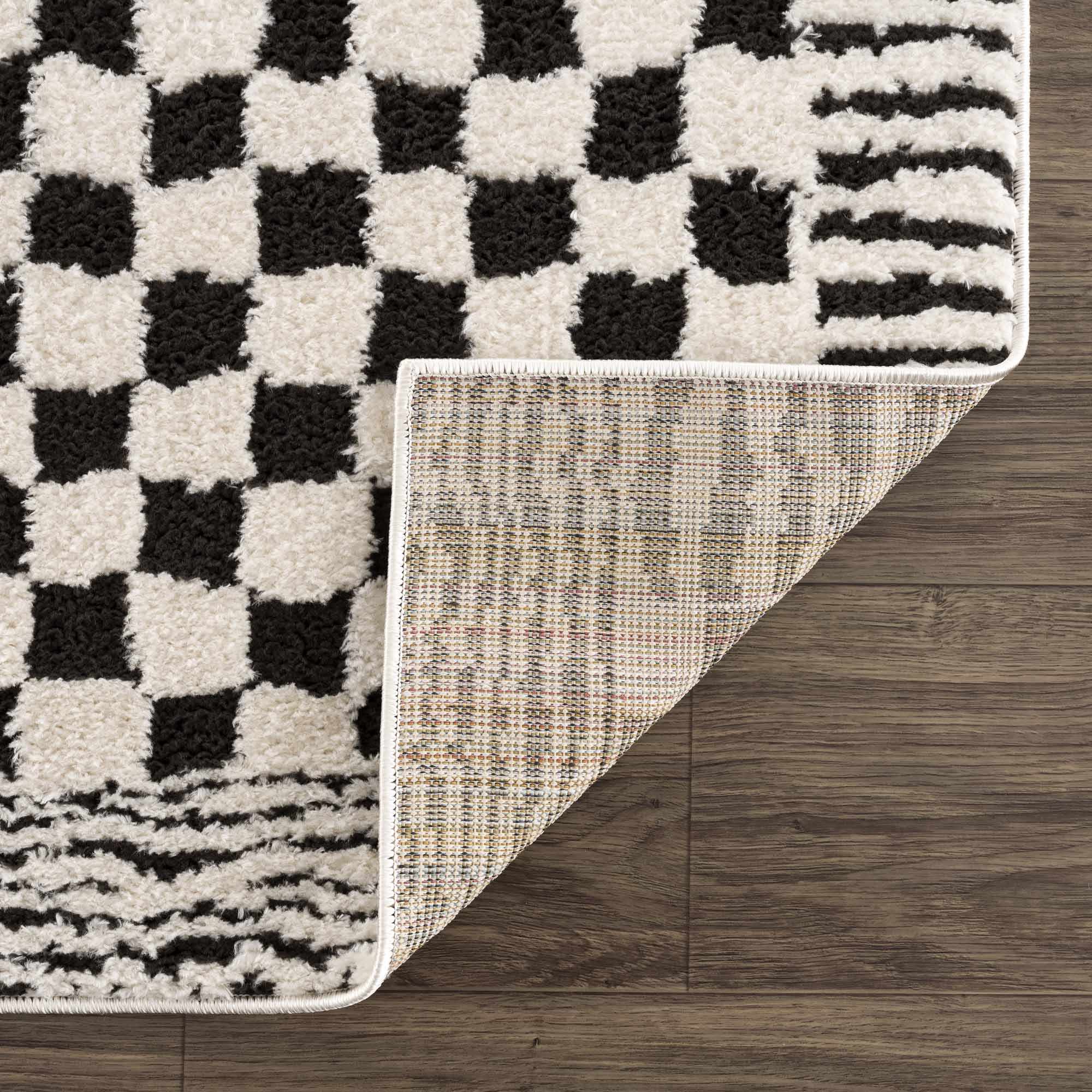 Leryn Black & White Checkered Area Rug - thewrightstore