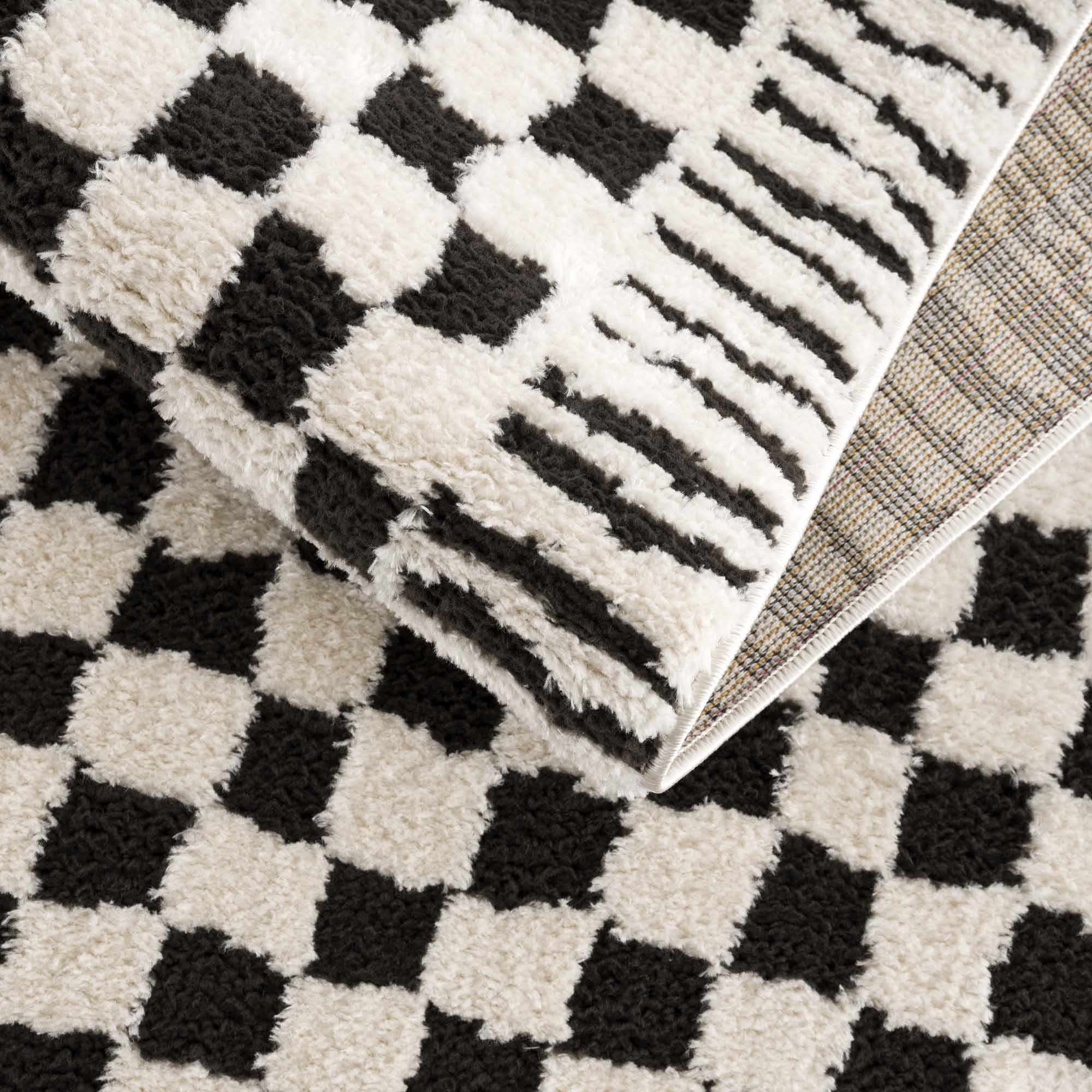 Leryn Black & White Checkered Area Rug - thewrightstore