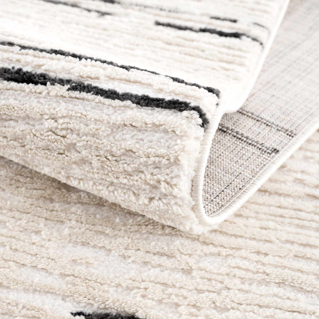 Riad Black Striped White Rug with Tassels - thewrightstore