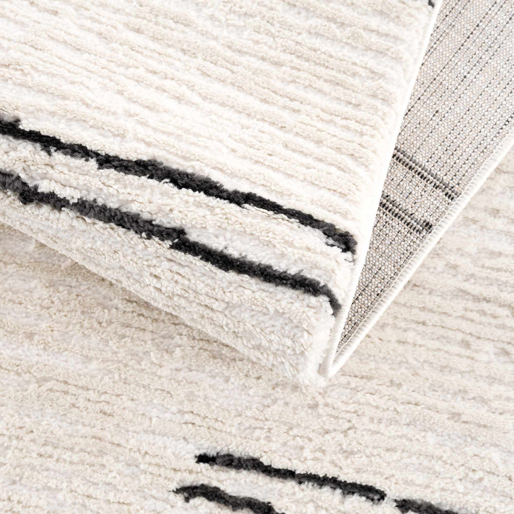 Riad Black Striped White Rug with Tassels - thewrightstore