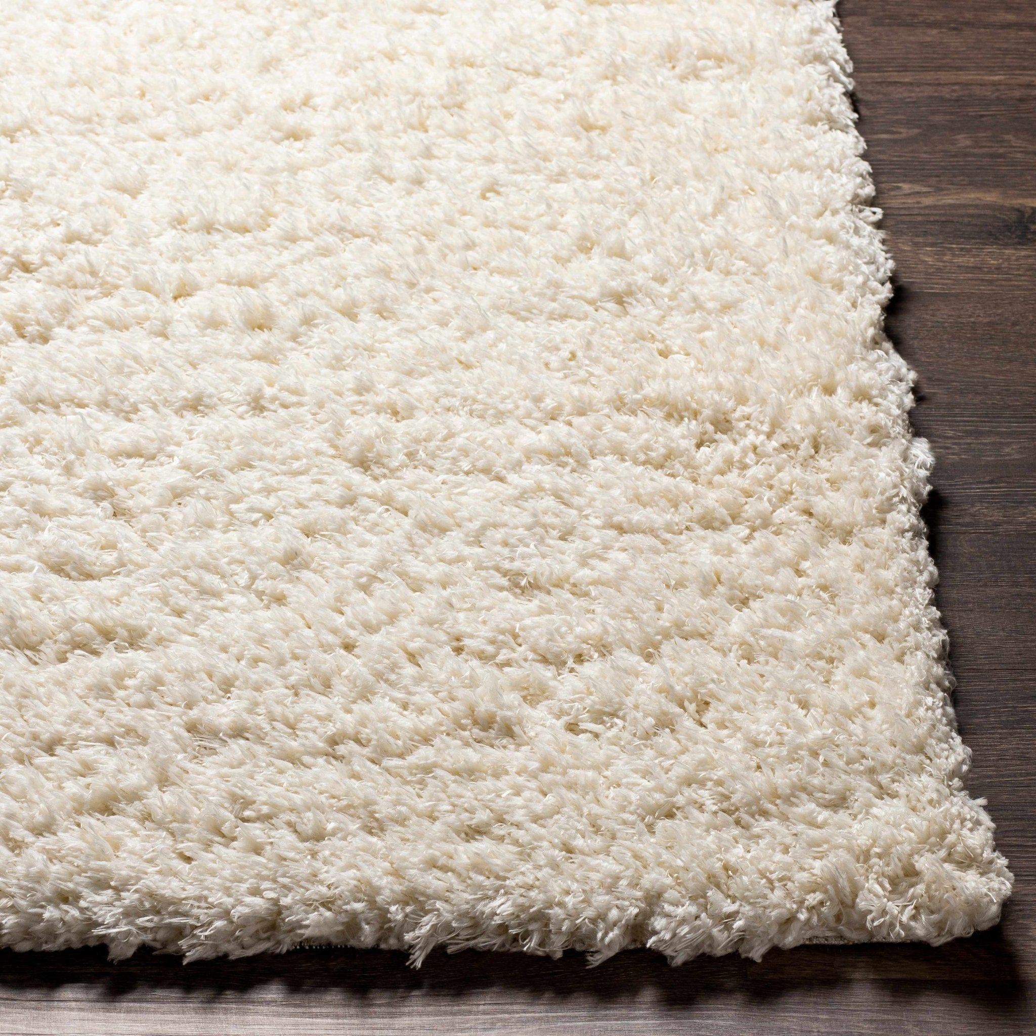 Siari Solid Cream Plush Rug - thewrightstore