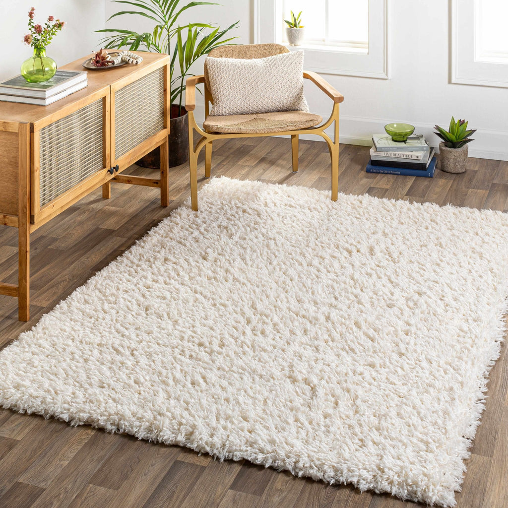 Siari Solid Cream Plush Rug - thewrightstore