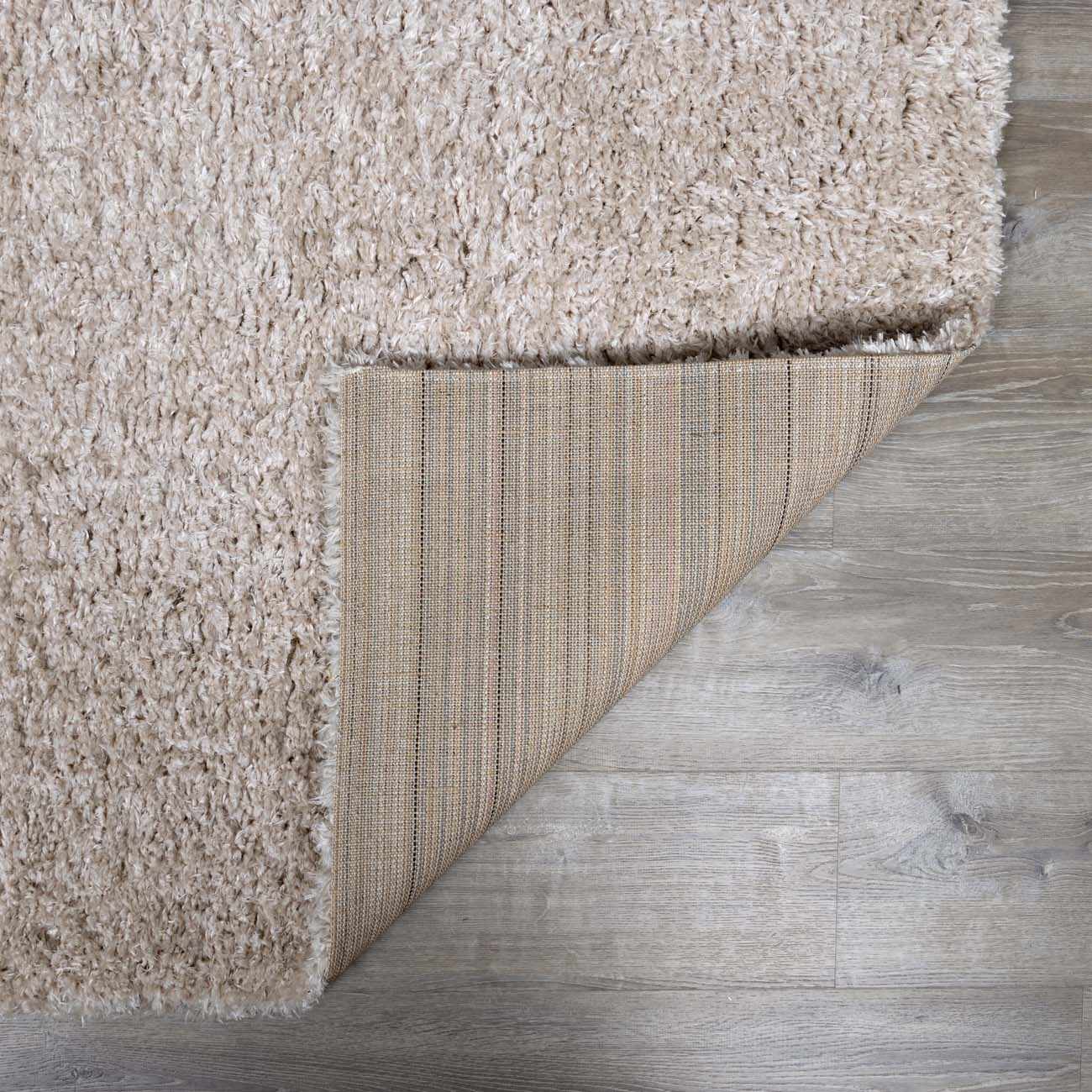 Siari Solid Oatmeal Shag Rug - thewrightstore