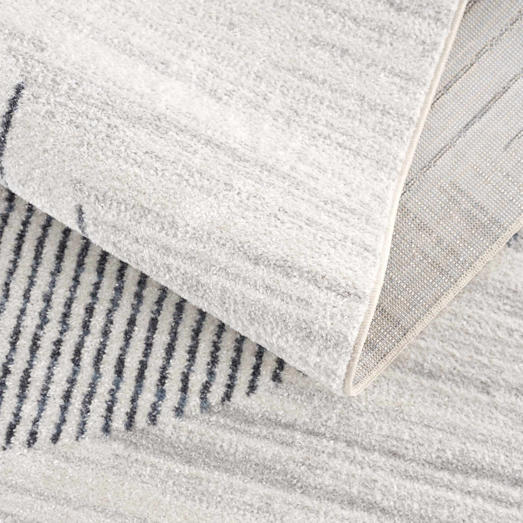 Thad Medium Gray Washable Area Rug - thewrightstore